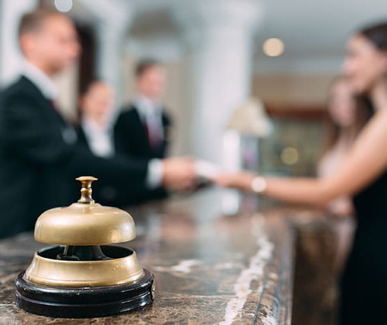 Woman at hotel reception